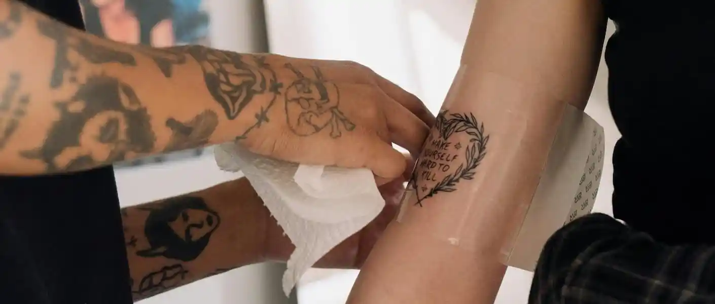 A tattoo being wrapped