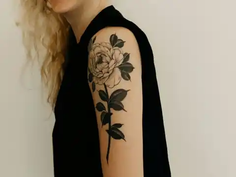 A floral upper arm tattoo