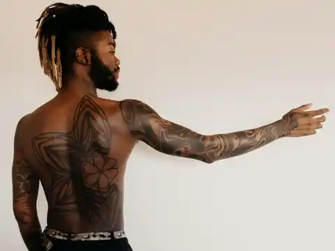 A back and sleeve tattoo