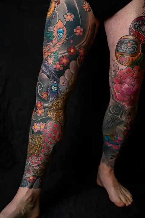 A full leg colourful tattoo