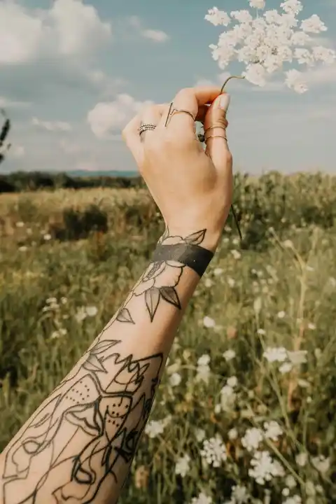 A patterned forearm tattoo