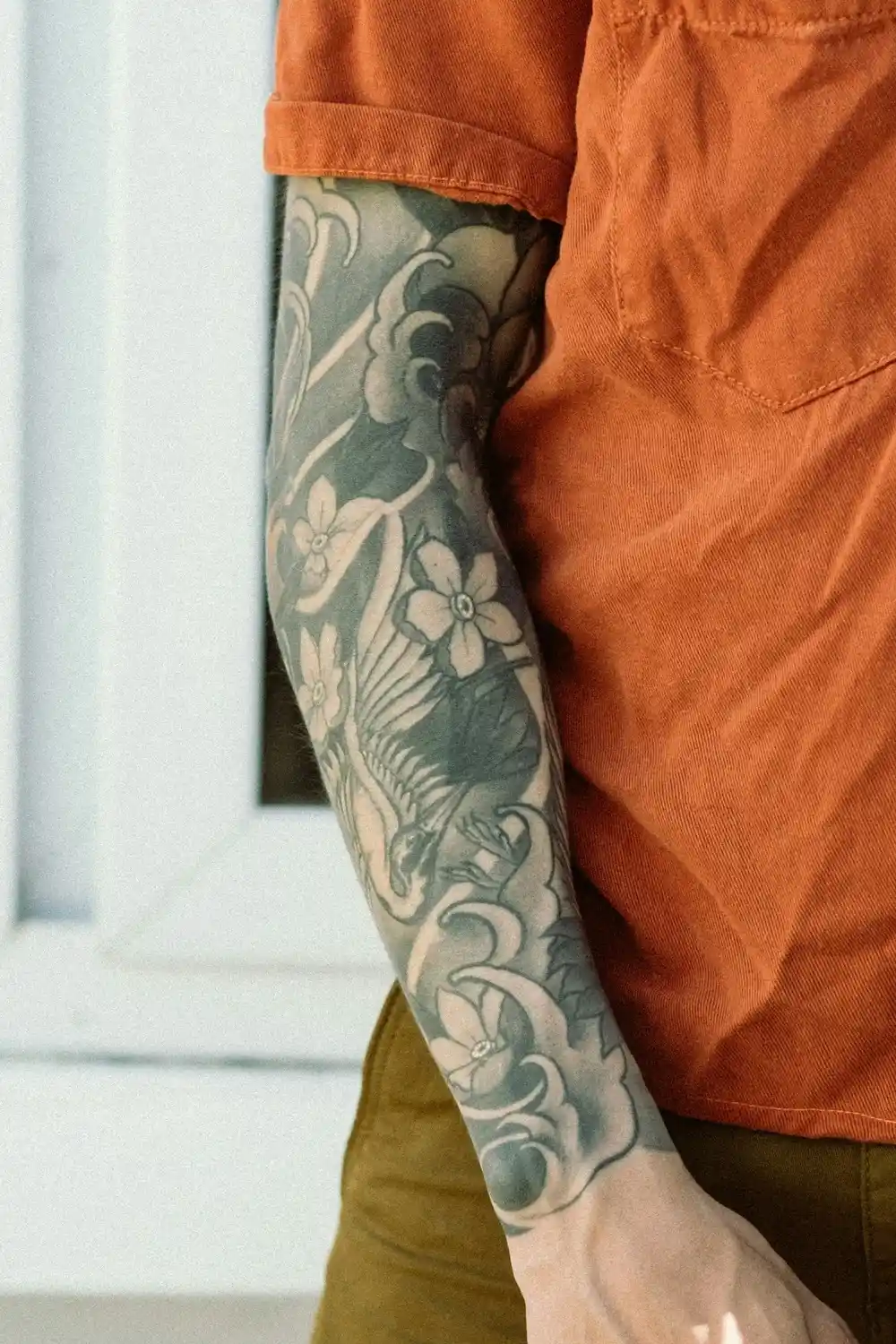 A full sleeve floral tattoo